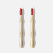 Two tapered candles shaped like witch’s fingers with red nail tips - Boowan Nicole