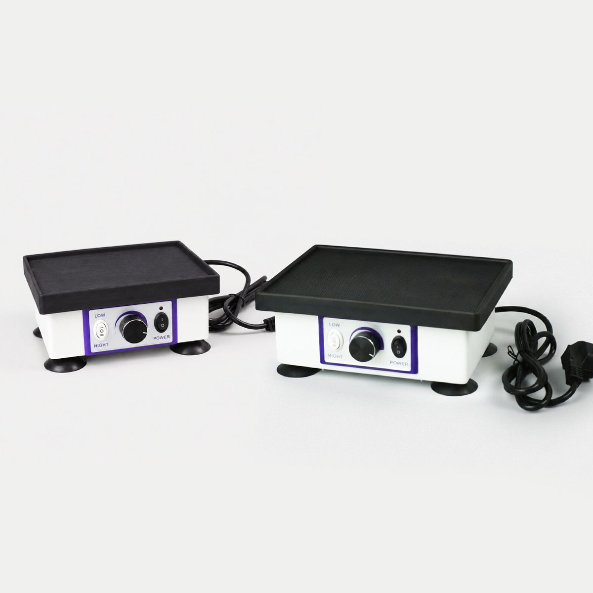 Large and small BN square vibration tables side by side