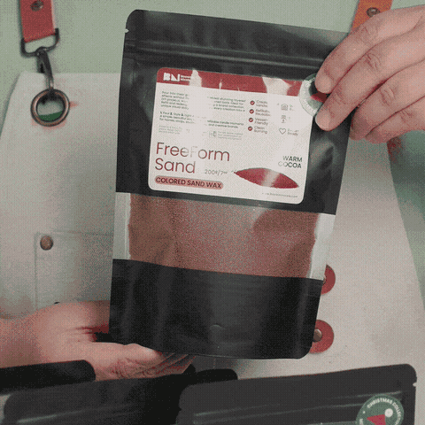 Holding a bag of Warm Cocoa colored sand wax