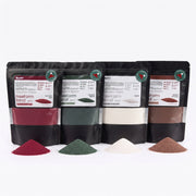 Christmas Series colored sand wax in Vintage Red, Vintage Green, White and Warm Cocoa bags with loose sand