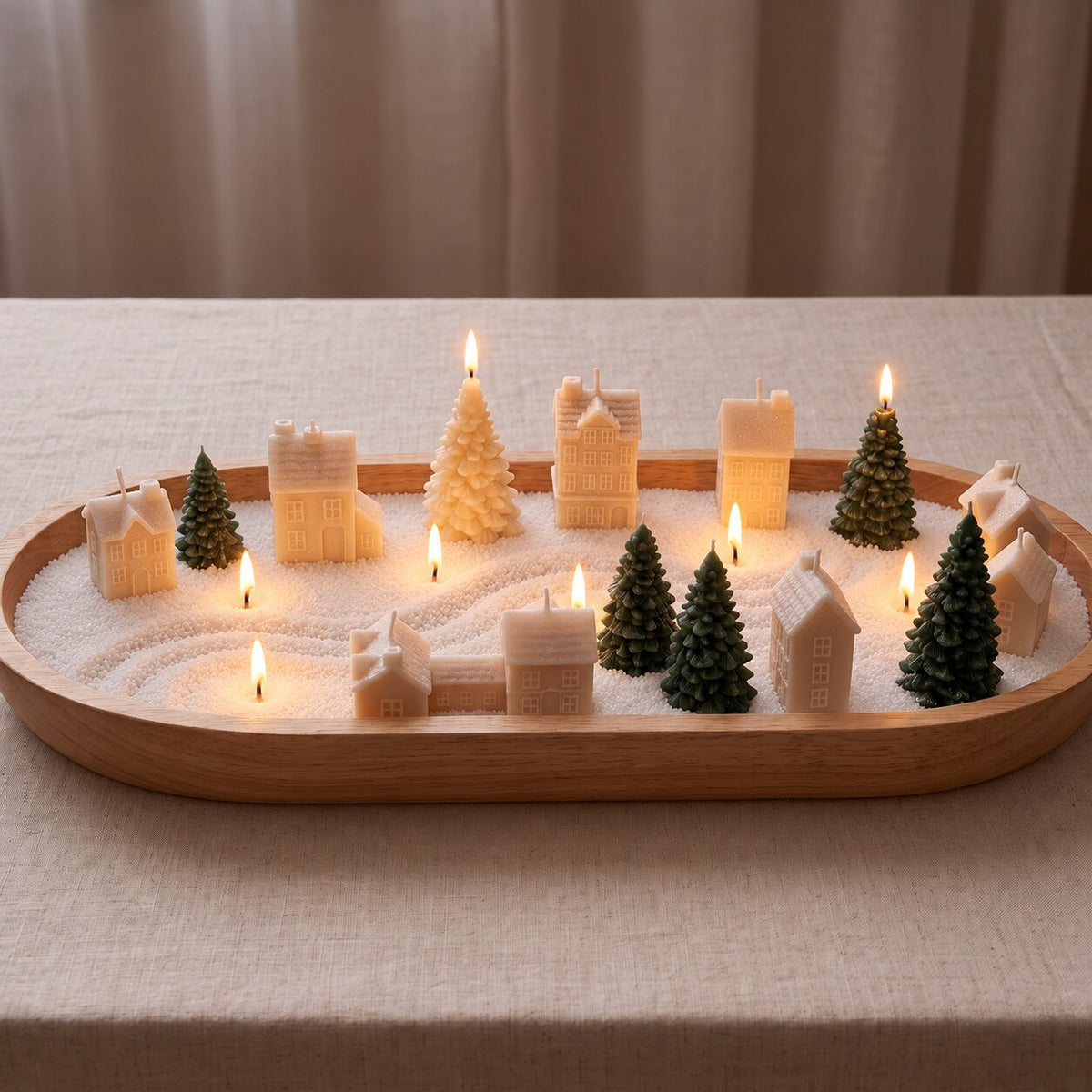 Oval wooden tray centerpiece with white sand wax, house and tree candles