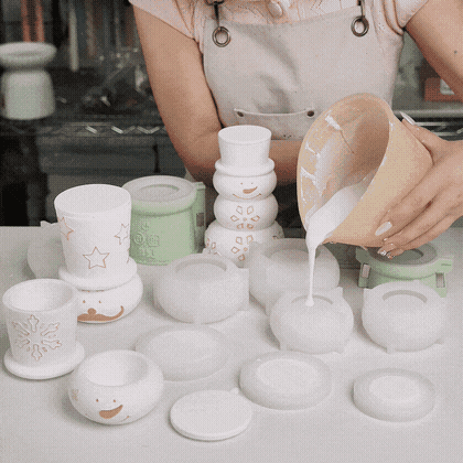 Animation of pouring cement into the snowman candle jar silicone molds