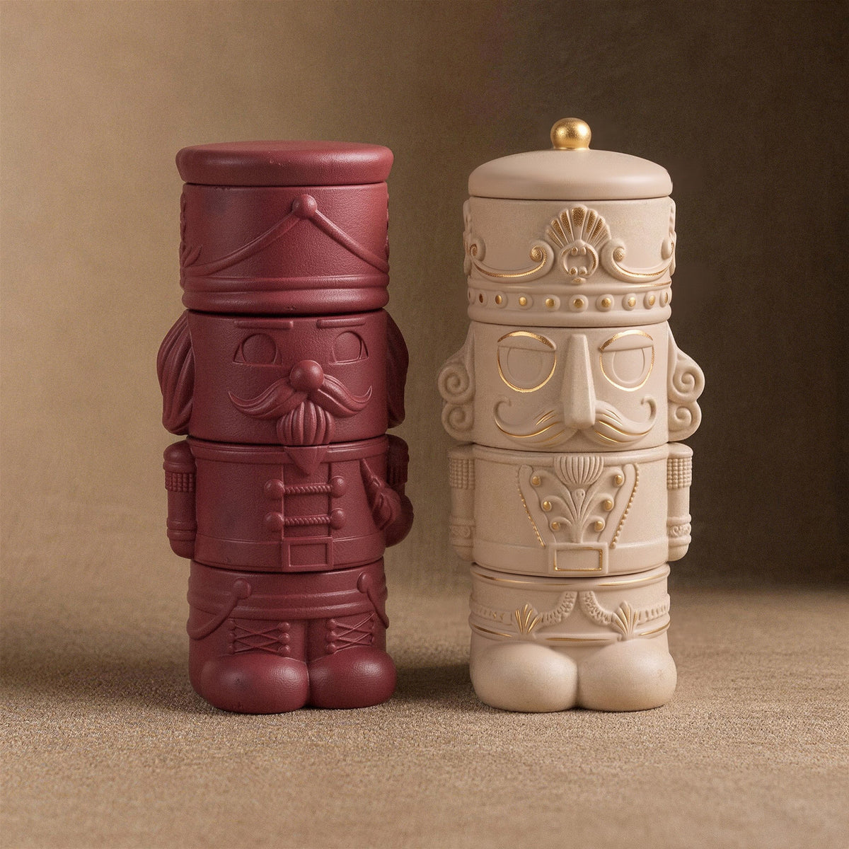 Assembled red toy soldier and cream nutcracker stacking candle jars