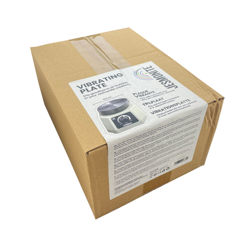 Cardboard box with a label for a vibrating plate on a white background