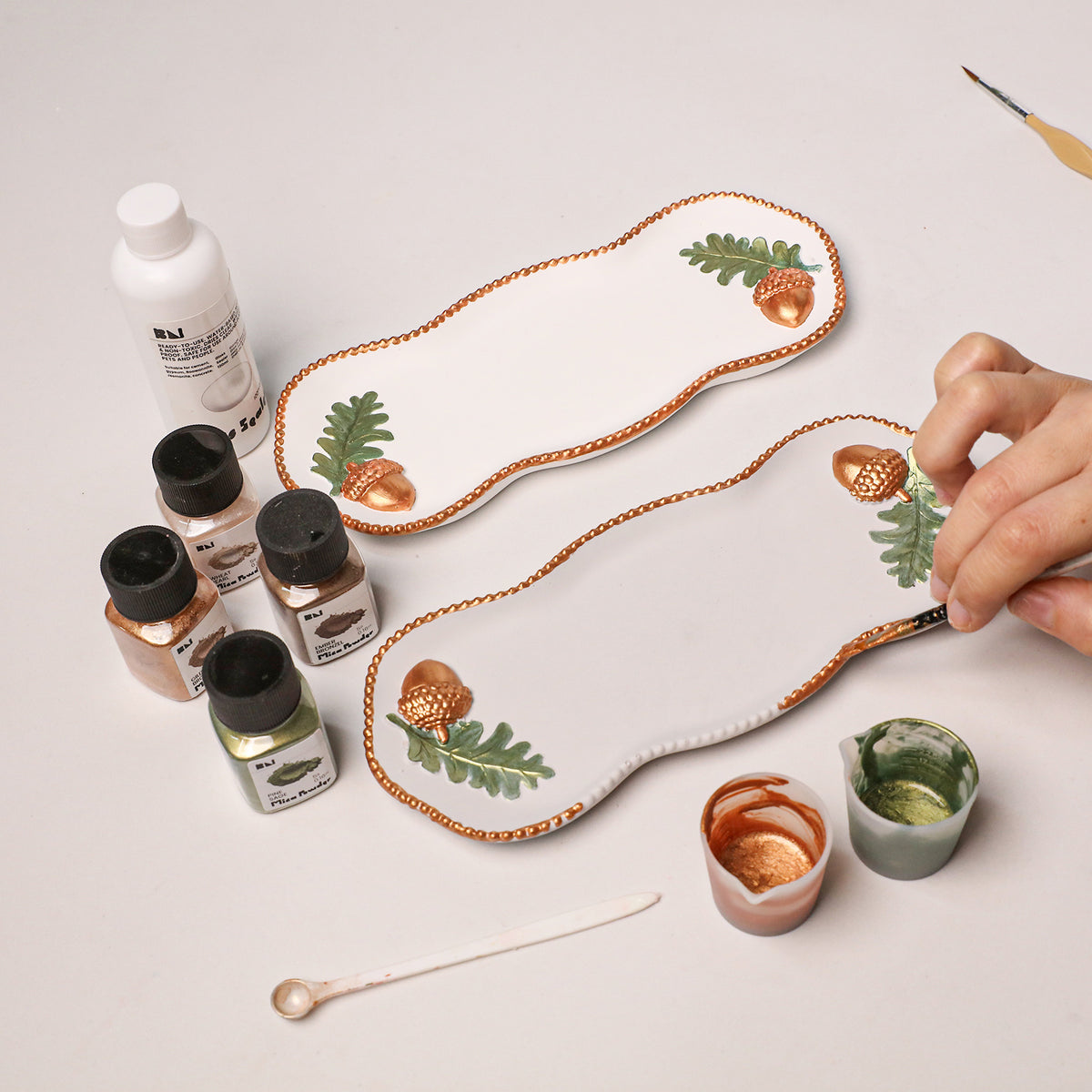 Forest Acorn silicone mold with mixing jars and colored resin pigments