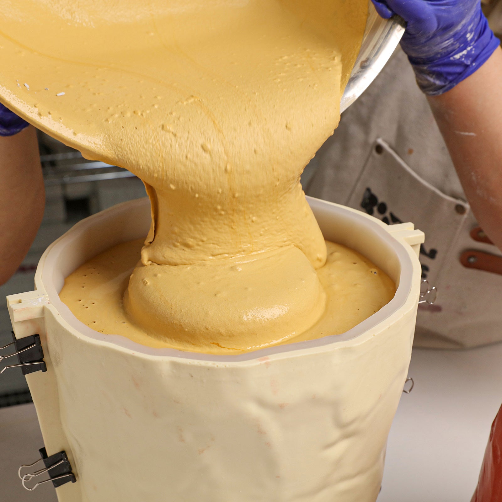 Pouring Cement into Chiseled Stone Planter Mold - Boowan Nicole