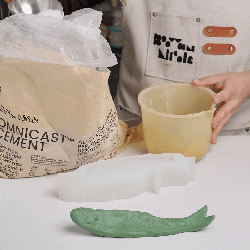 Mixing OmniCast cement and colour for a fish incense holder