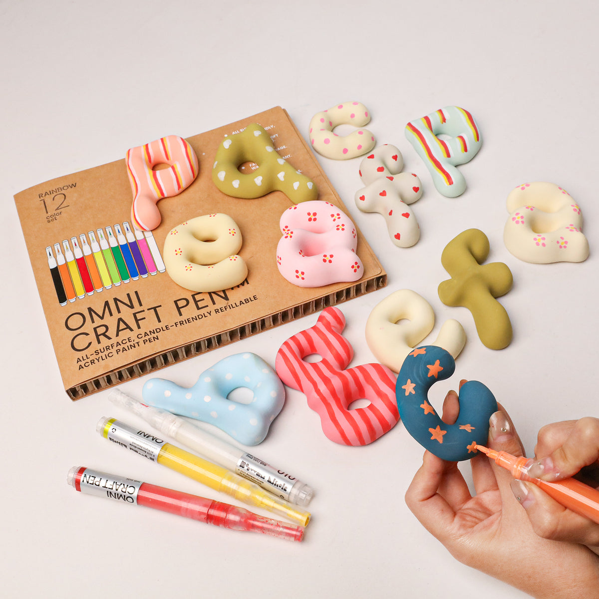 Colourful lowercase letter crafts and a 12-colour acrylic marker set