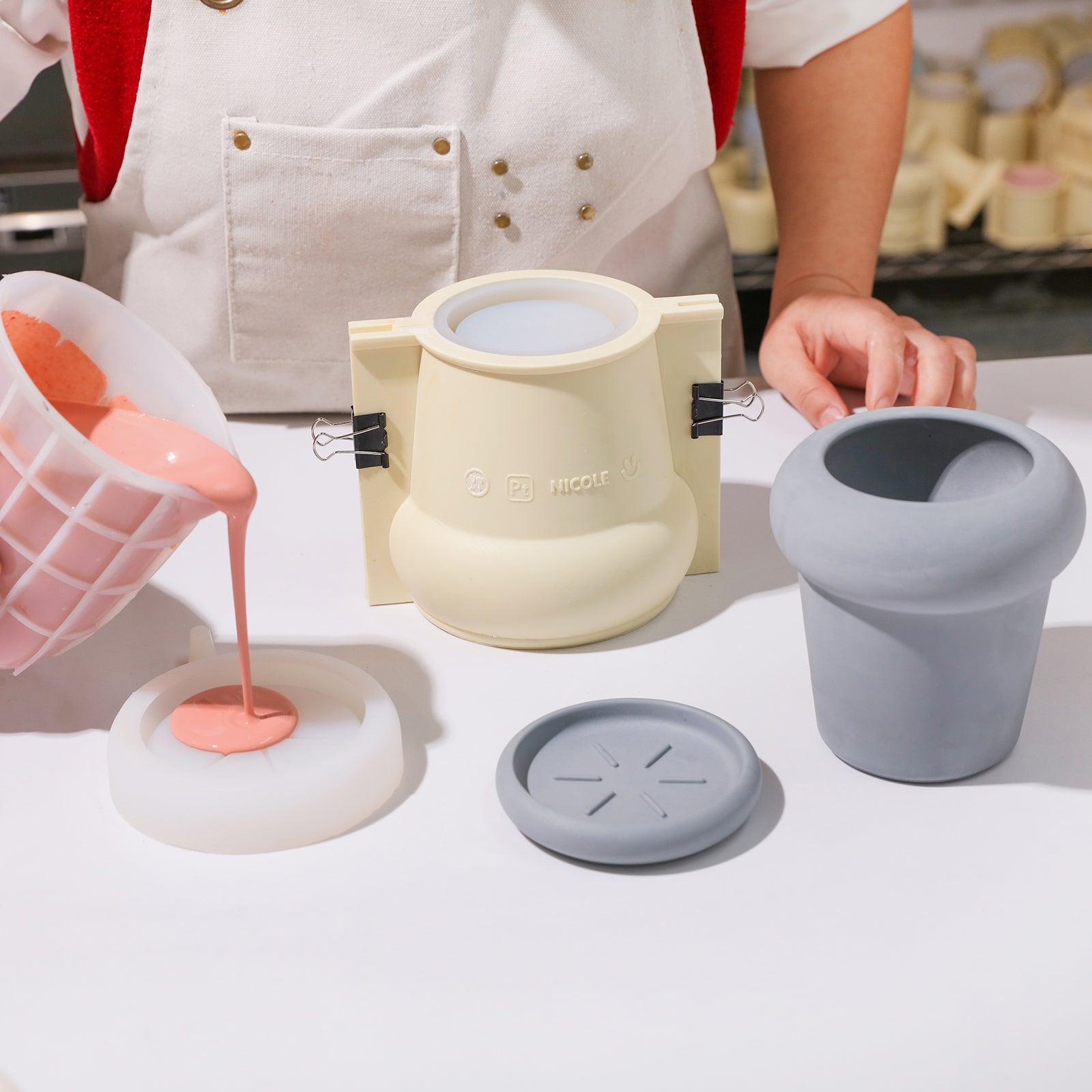 Pour boowannite material into silicone mold to make Tall Botanic Column Plant Pot - Boowan Nicole