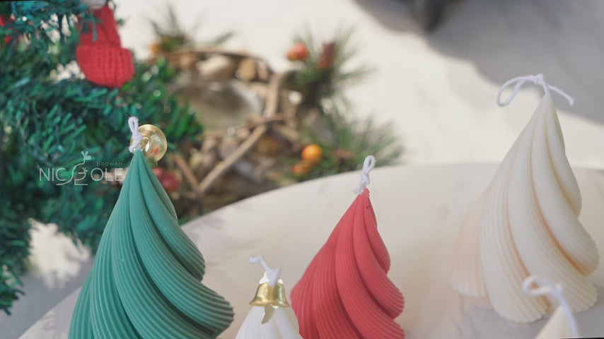 Video of making a Spiral Christmas Tree Candle using silicone molds - Boowan Nicole