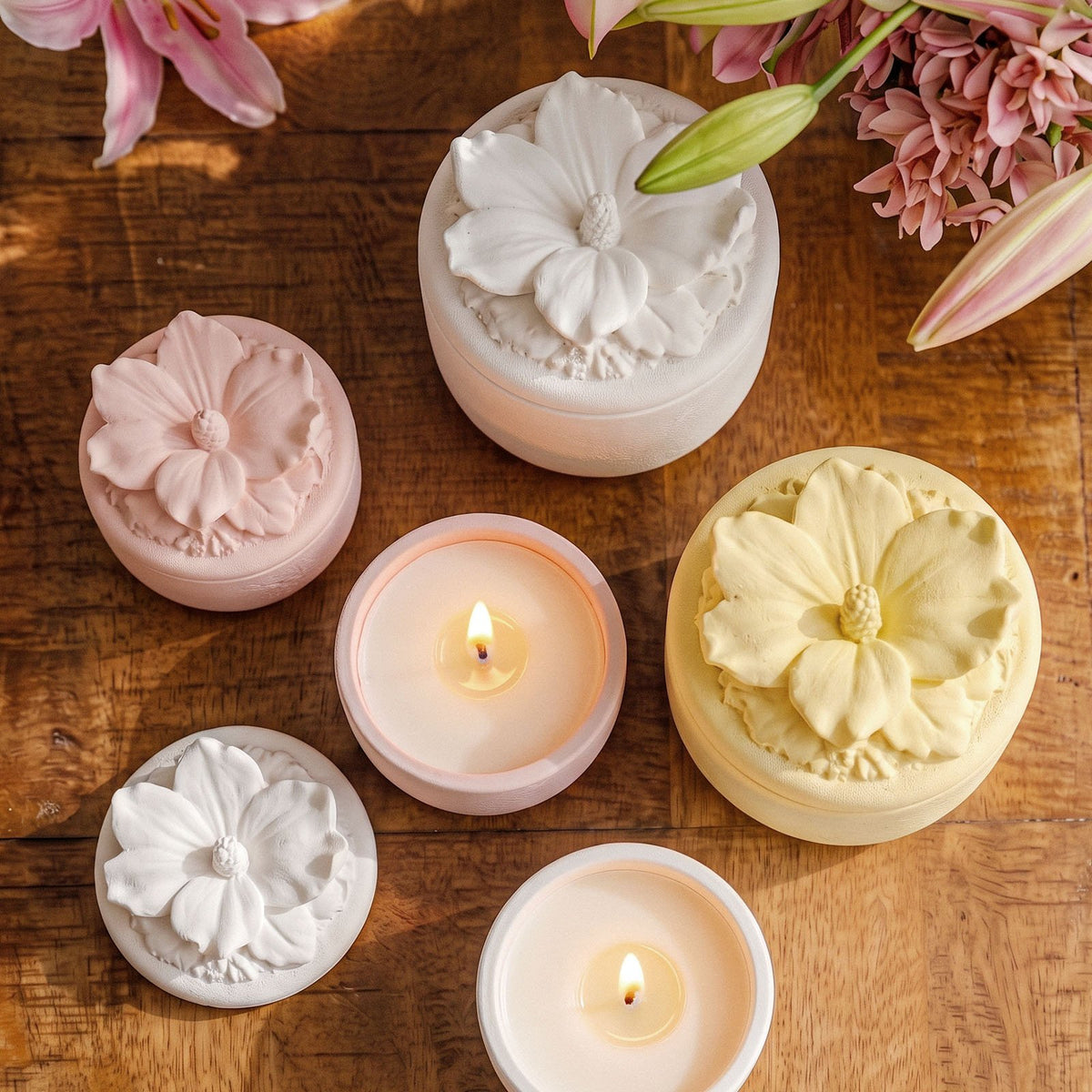 Hibiscus candle jars and lids on a wooden table