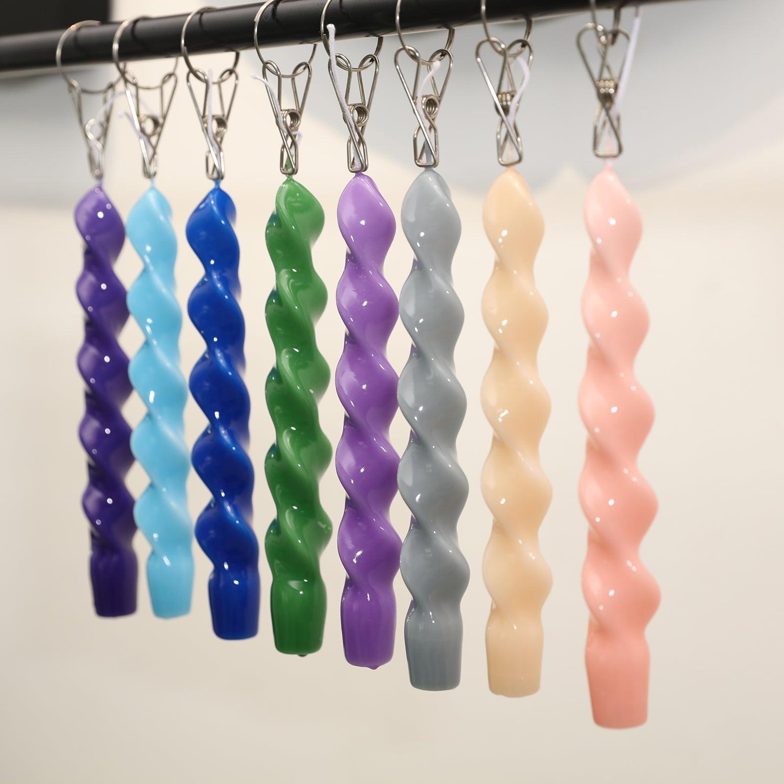 Spiral Taper Candle-Boowan Nicole hanging on the shelf with a clip
