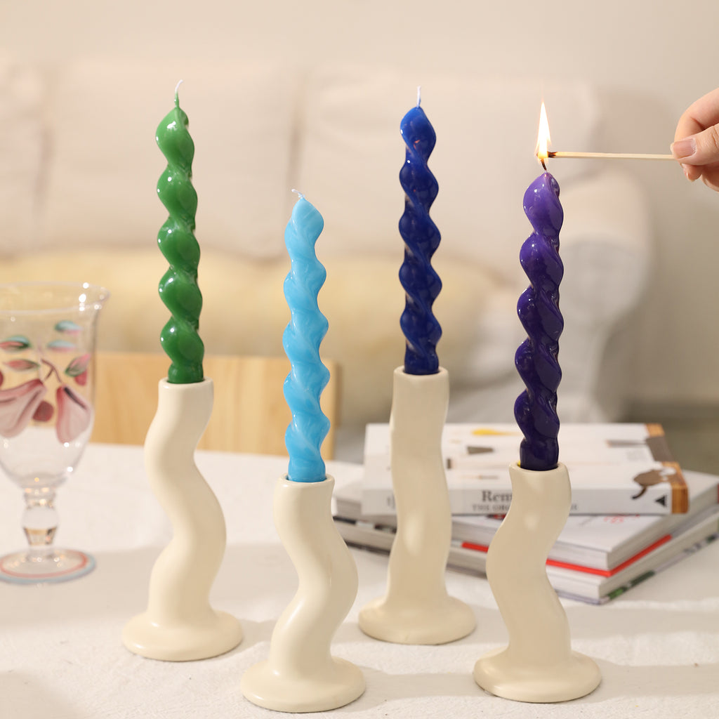 Light the purple Spiral Taper Candle-Boowan Nicole placed in the candle holder