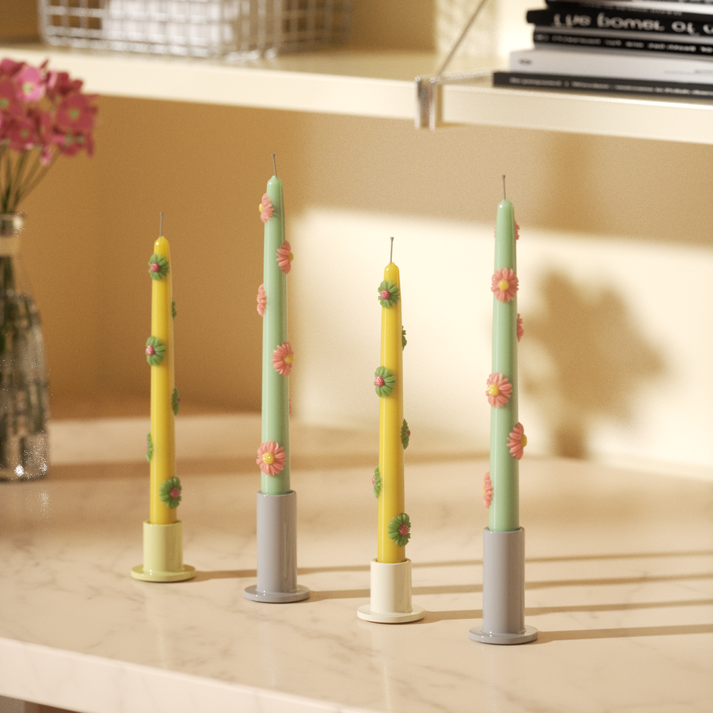 Teal and yellow taper candles with daisy decoration on tabletop candle holder - Boowan Nicole