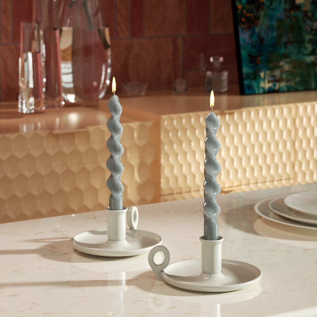 Glossy Spiral Taper Candle in gray on ceramic candle holder on dining table - Boowan Nicole