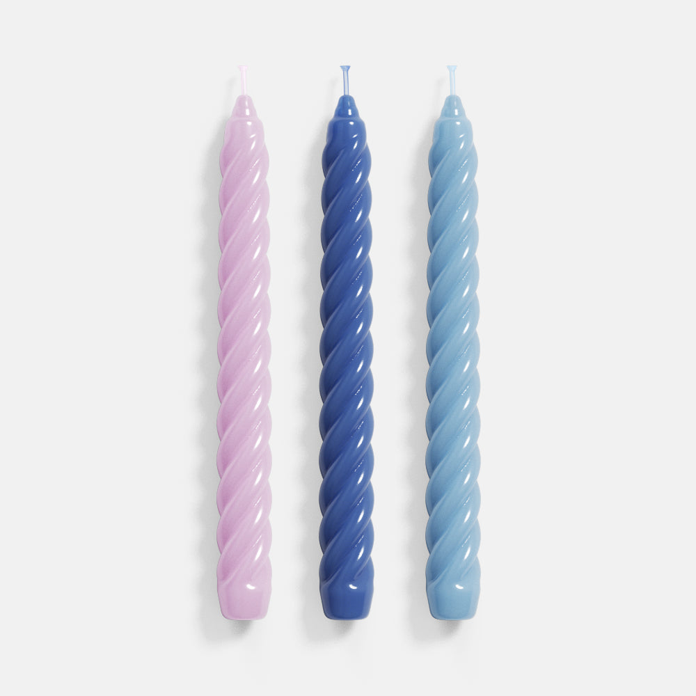 Three spiral candles crafted with precision using Boowannicole's silicone molds