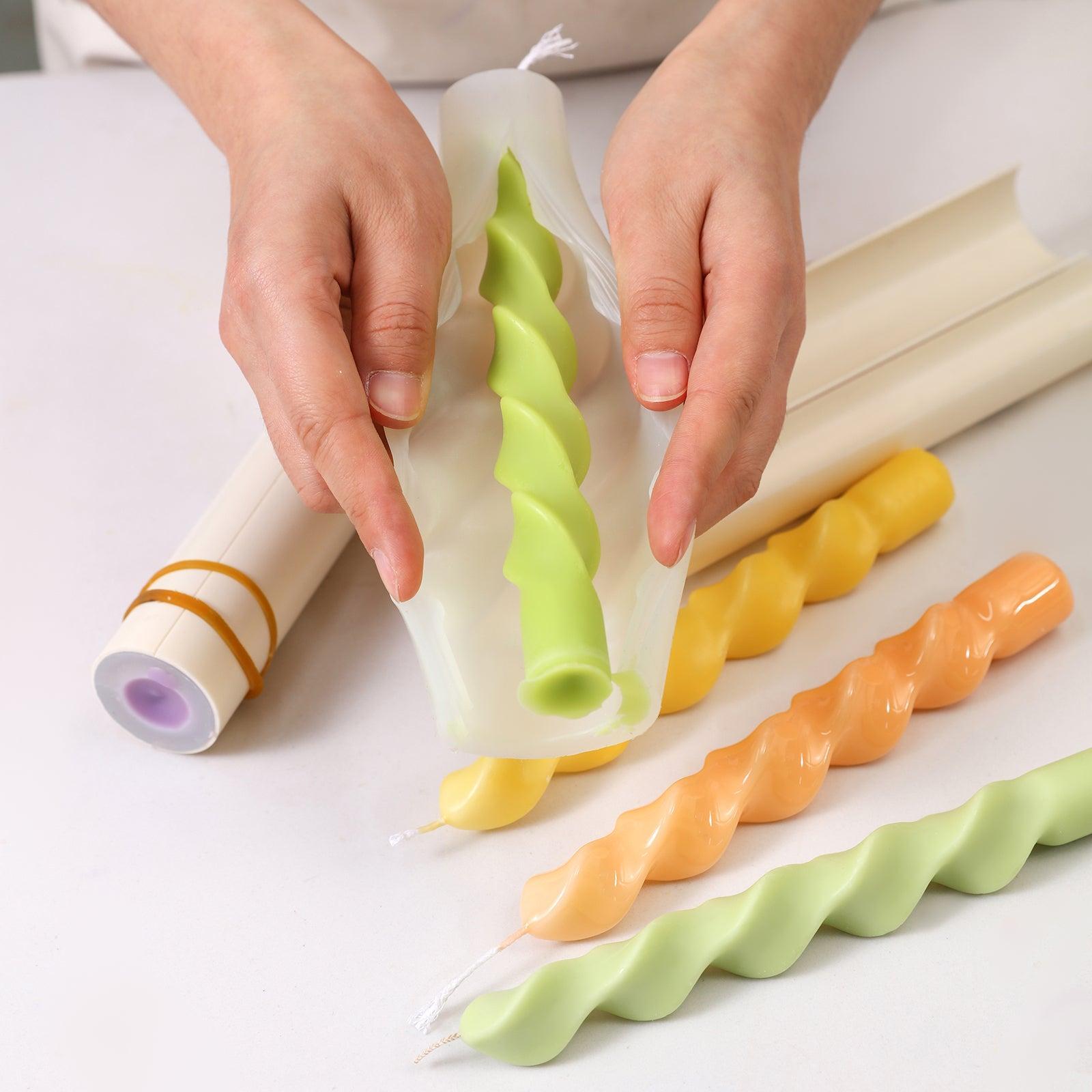 Effortlessly release solidified spiral candles from silicone molds.