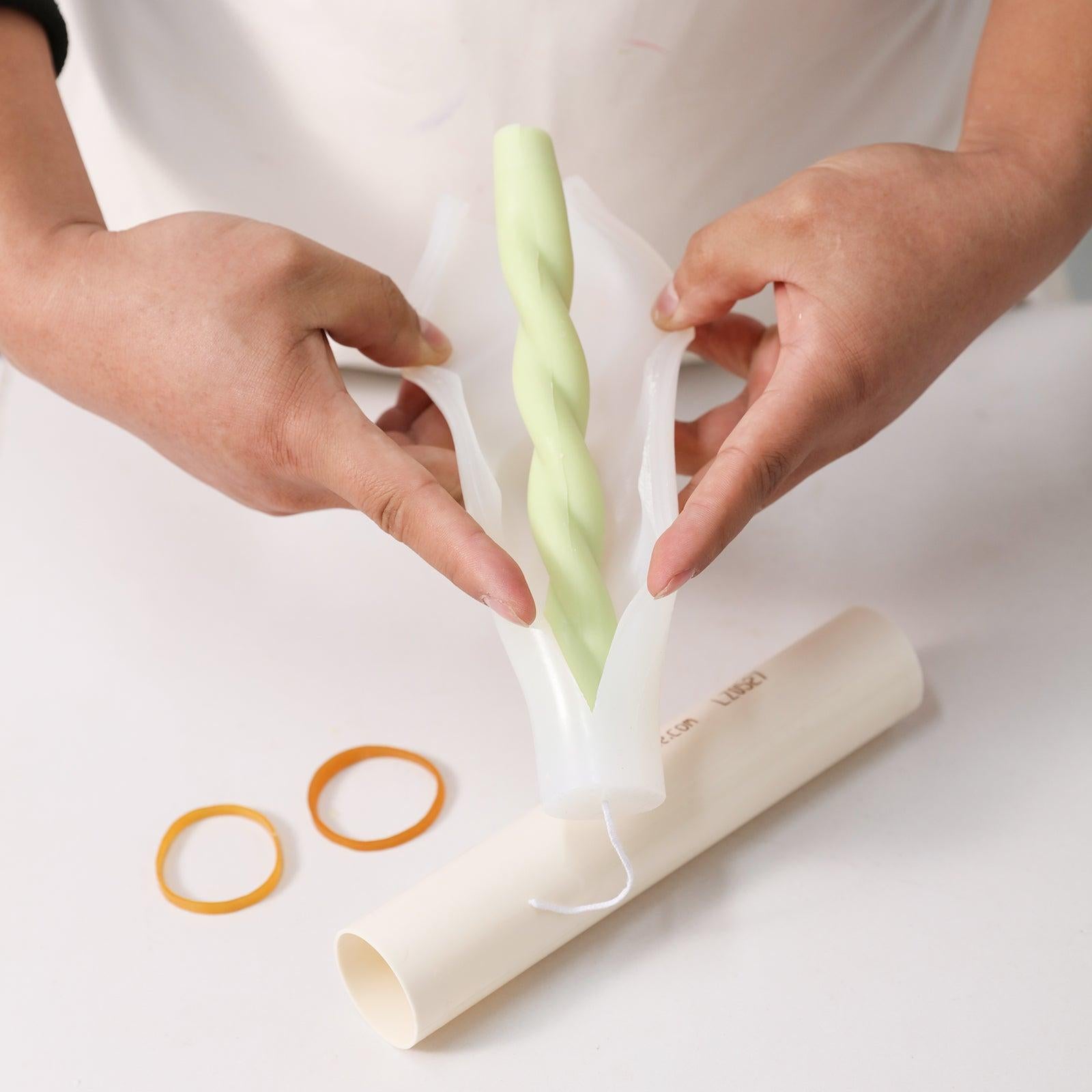 Easily release spiral candles from Boowannicole's silicone molds.