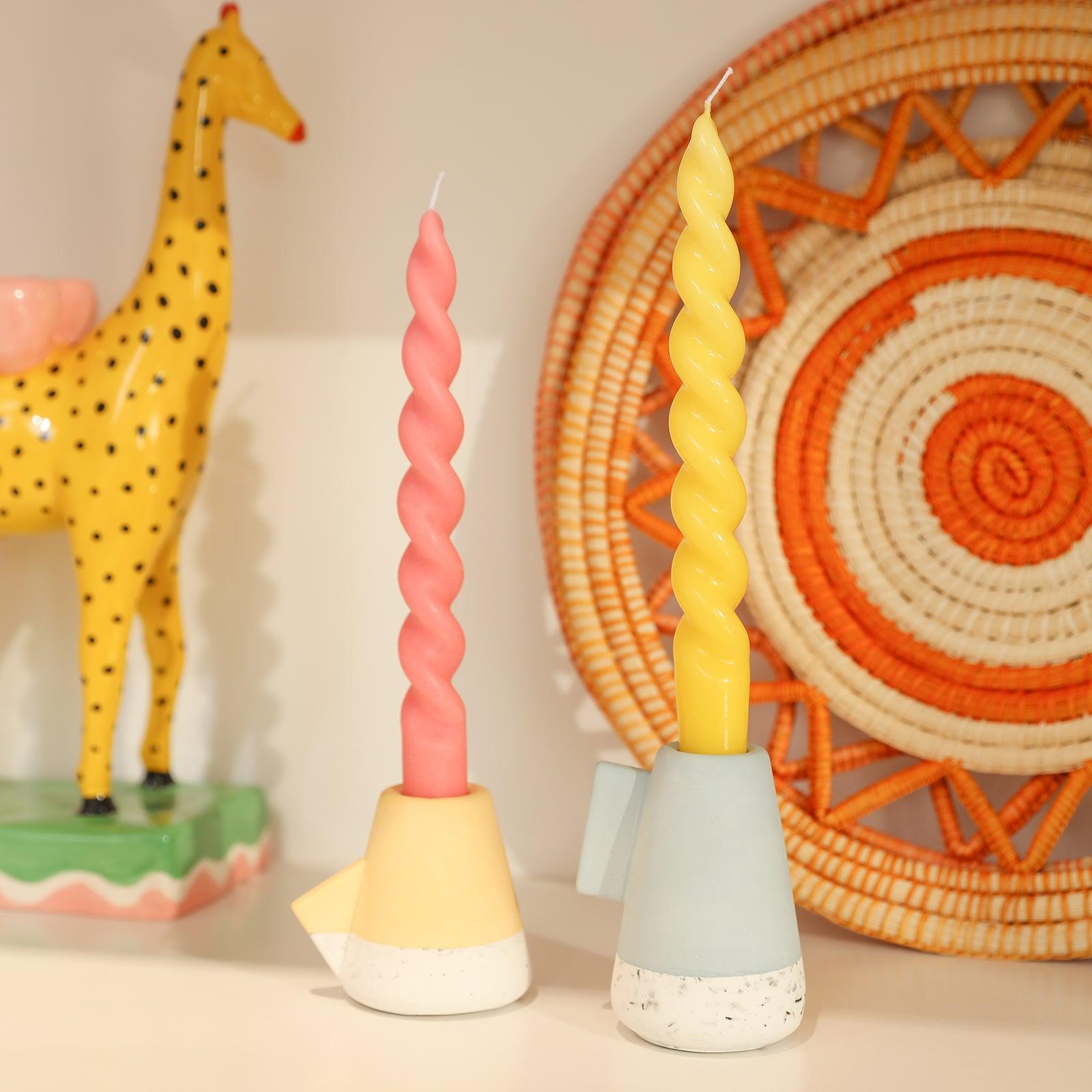 Vivid Display - Explore the striking display of red and yellow candles, a testament to Boowannicole's commitment to vibrant and quality taper candles.