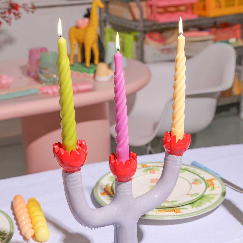 Create a cozy atmosphere with Boowannicole's trio of lit Spiral Taper Candles, beautifully arranged on your dining table for a warm and inviting setting.