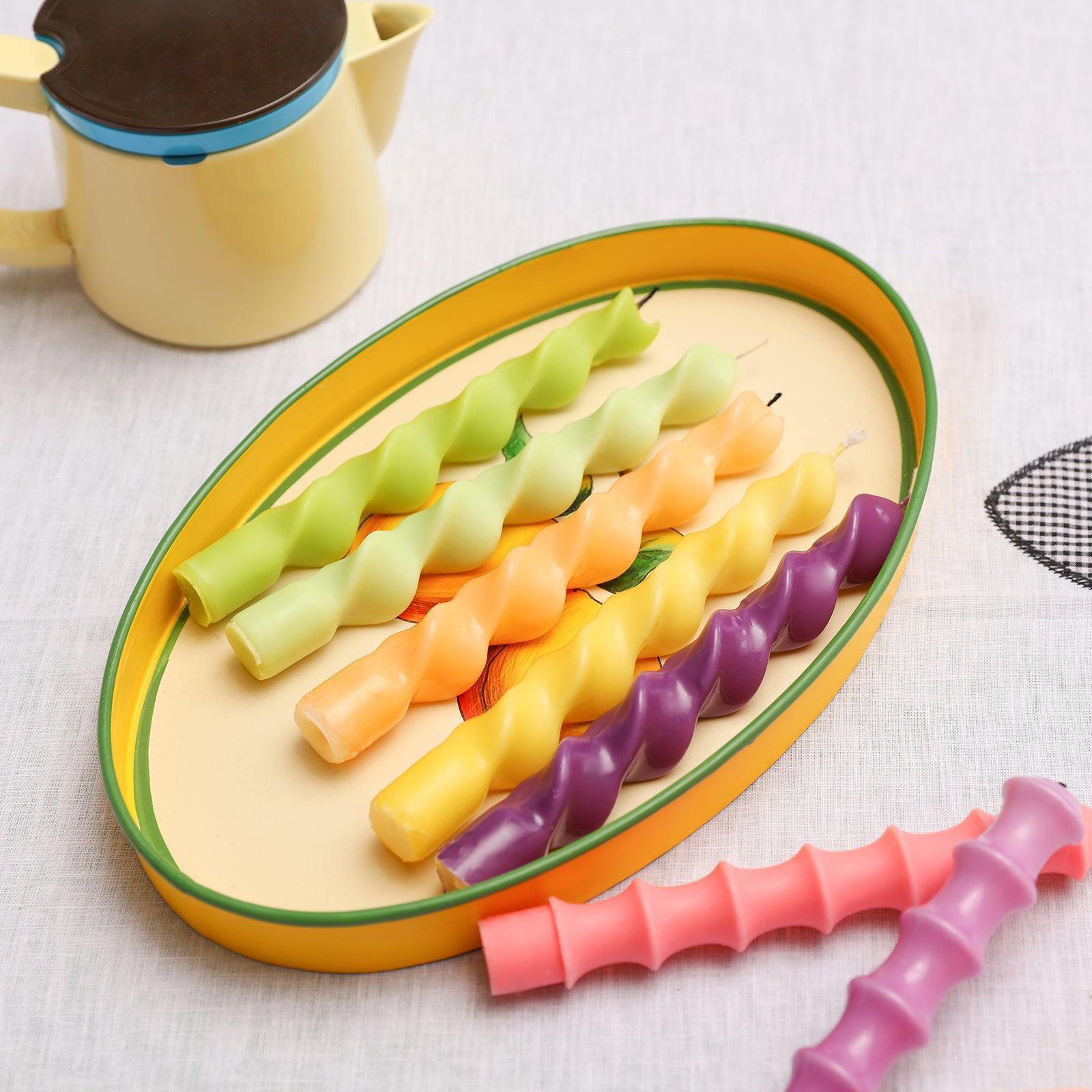 Taper candles crafted with Boowannicole's silicone molds