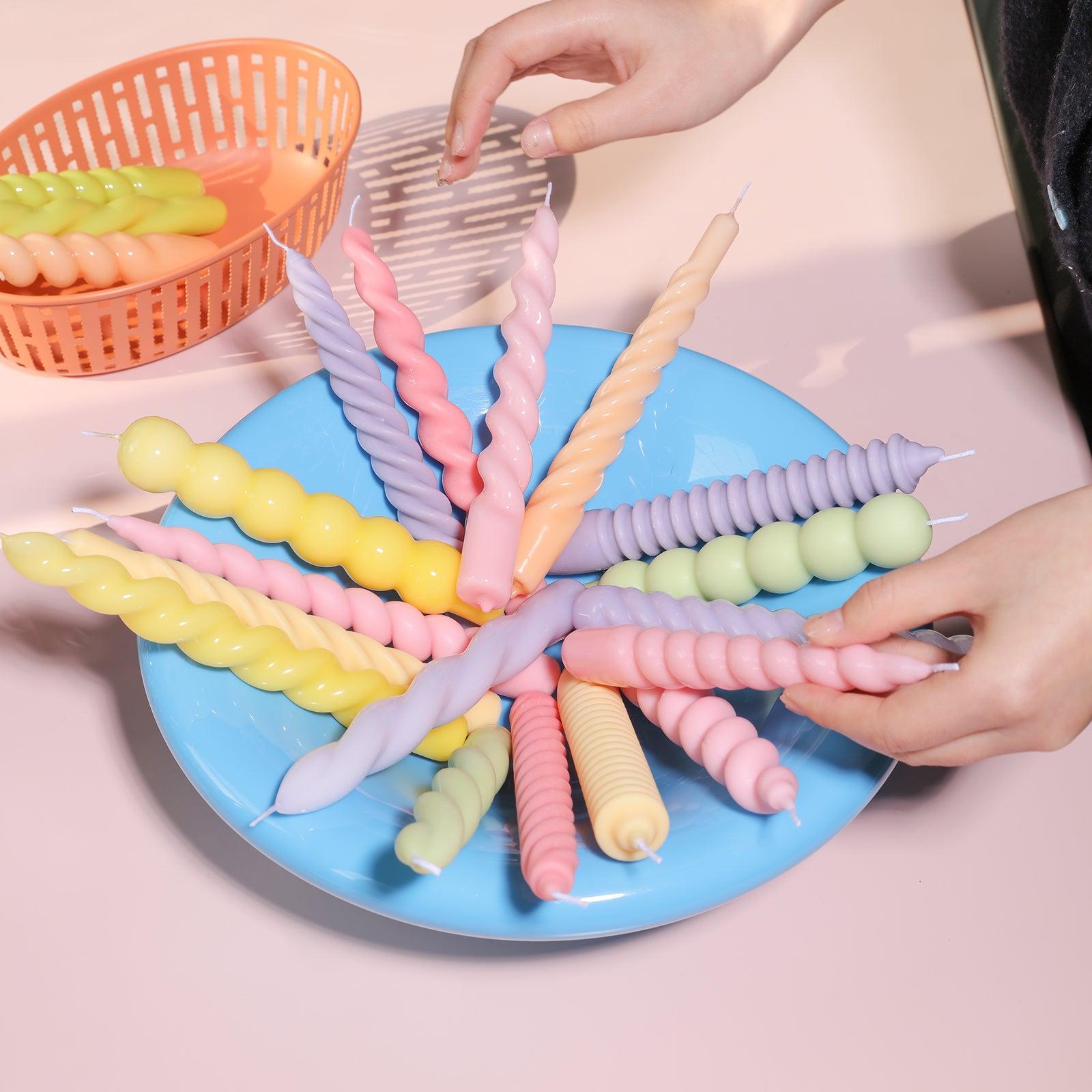 Assorted Taper Candles showcased in a plate, a vibrant display of colors and elegance by Boowannicole.