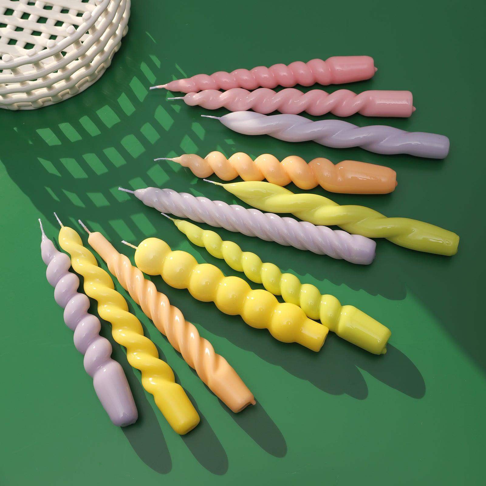 "Variety in Form and Color - Adorn your space with a diverse array of cone candles, each uniquely crafted with Boowannicole's silicone molds, adding character to your decor.